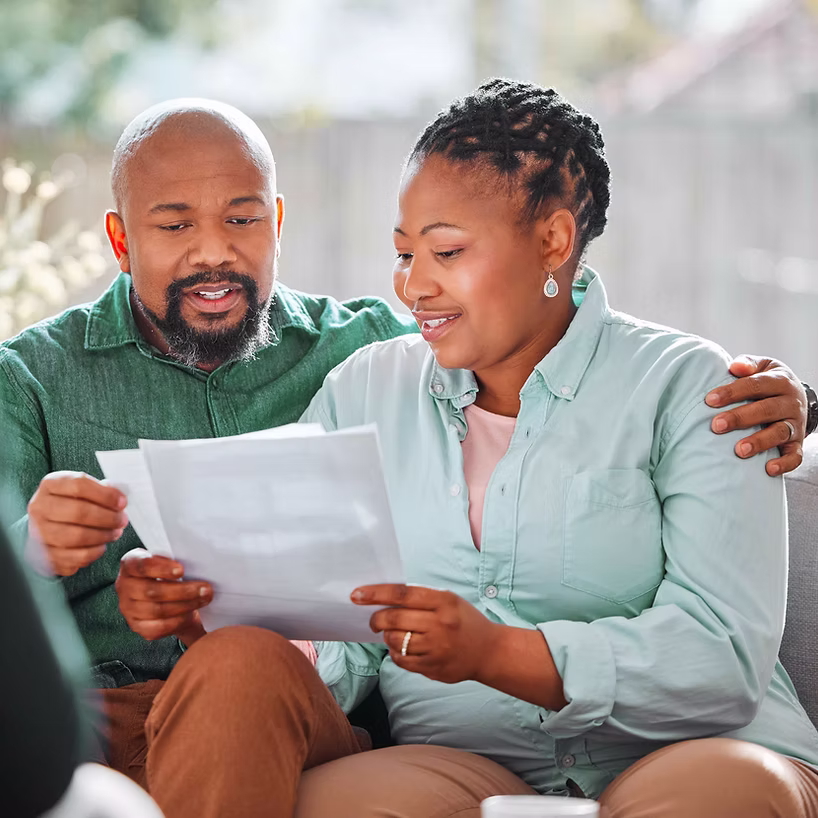 Couple reviewing health documents